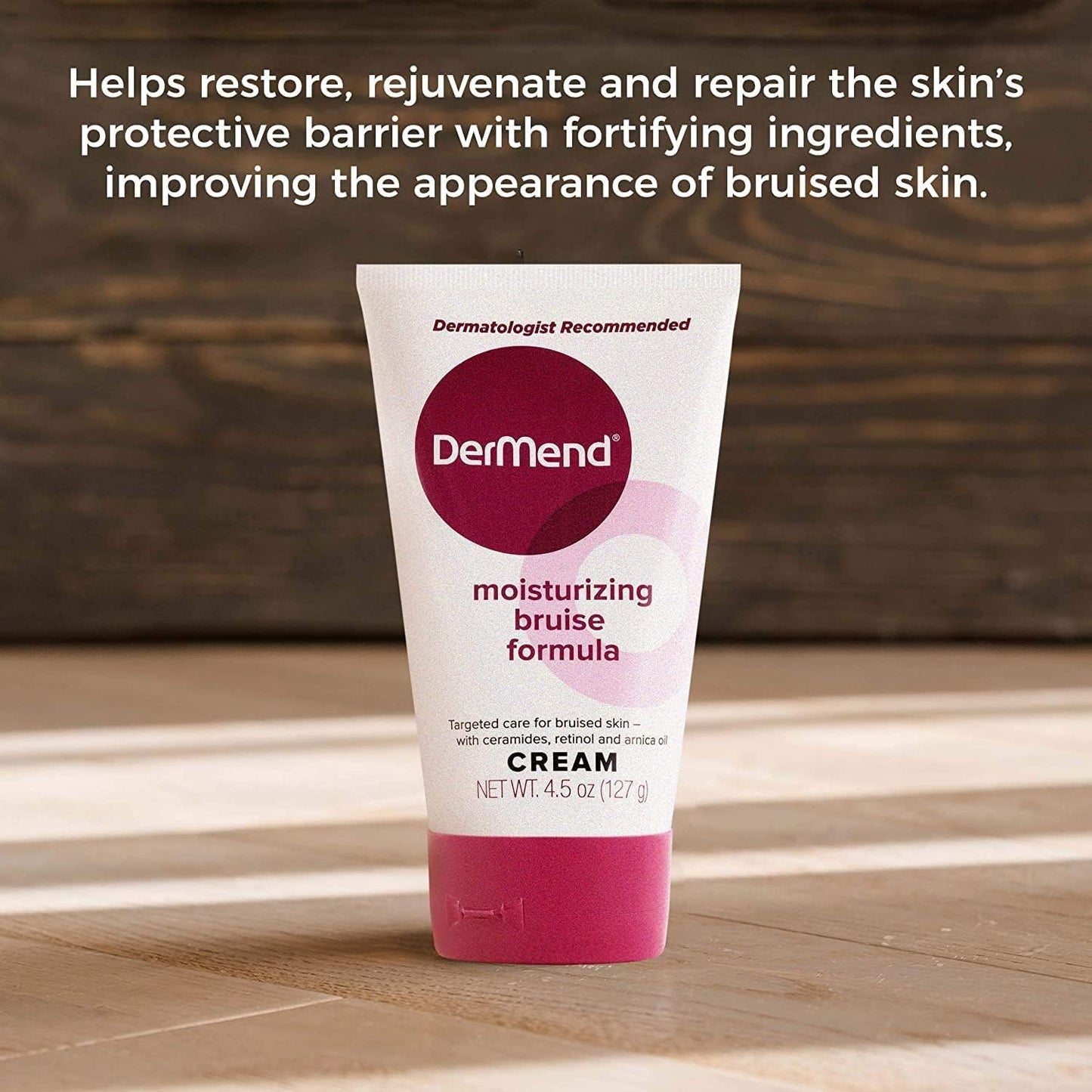 DerMend moisturizing bruise formula cream tube on a wooden surface with text about skin care benefits.