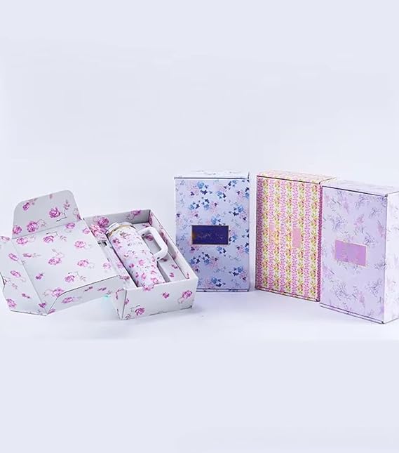 Set of floral-patterned boxes on a light gray background