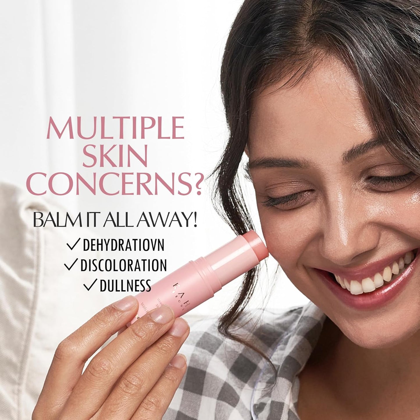 Woman holding a pink skincare product with text about skin concerns and solution.