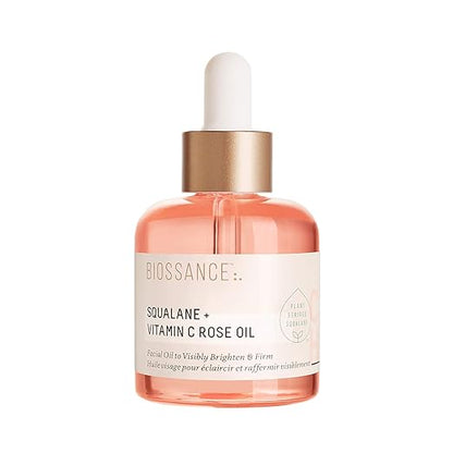Biossance Squalane + Vitamin C Rose Oil bottle on a white background