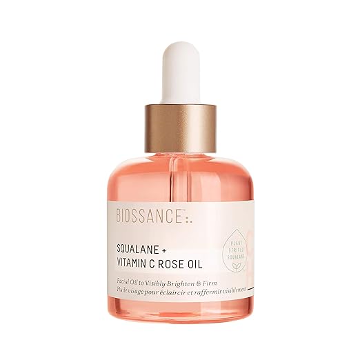 Biossance Squalane + Vitamin C Rose Oil bottle on a white background