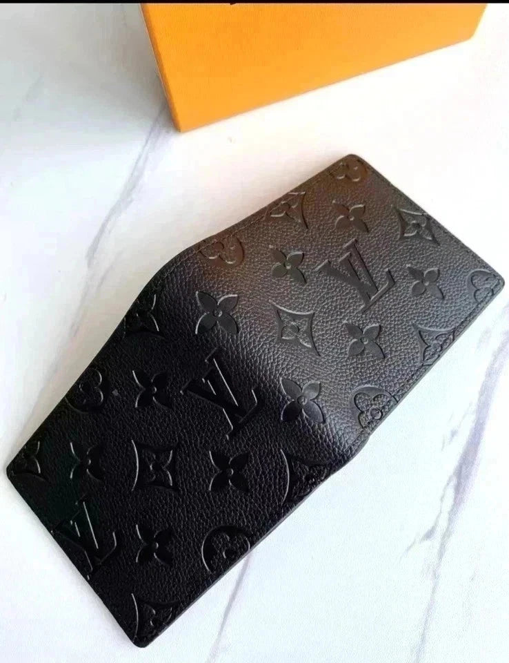 Black embossed wallet with brand logo on a white background