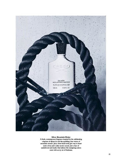 Crespo Silver Mountain Water bottle wrapped in black rope on a light gray background