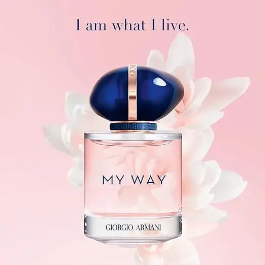 Giorgio_Armani_perfume_bottle_with_blue_cap_on_a_pink_background