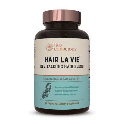 Hair La Vie revitalizing hair blend supplement bottle on a white background