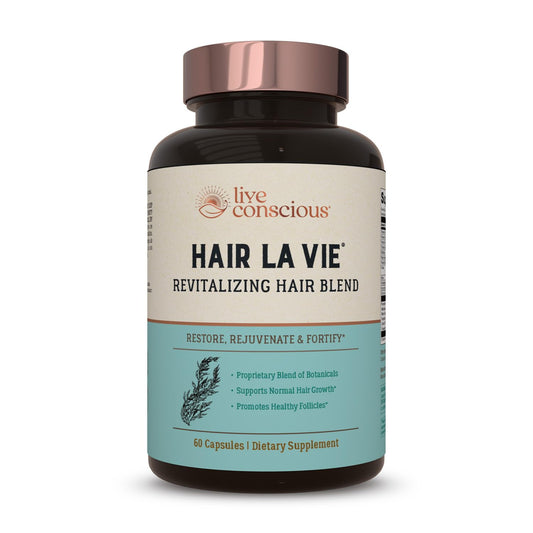 Hair La Vie revitalizing hair blend supplement bottle on a white background