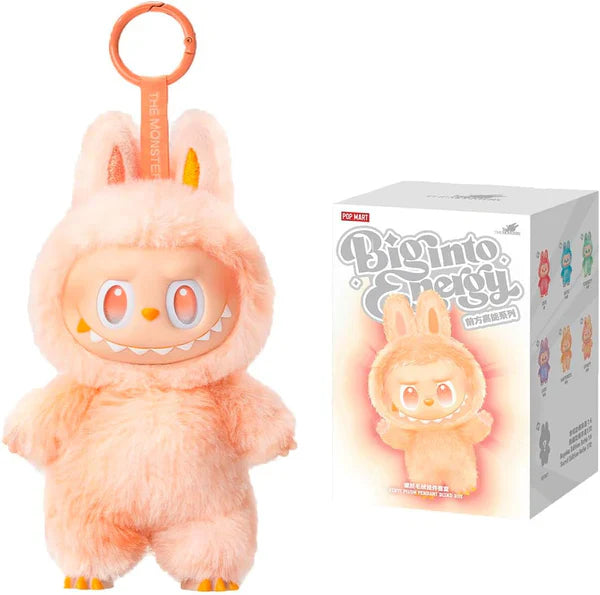 Plush toy with a keychain attachment and its packaging on a white background