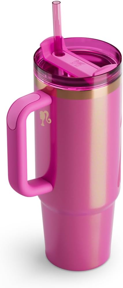 Pink insulated tumbler with handle and straw on a white background