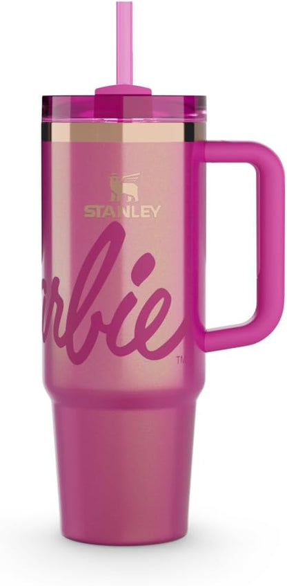 Pink tumbler with handle and straw featuring the 'Stanley' logo on a white background