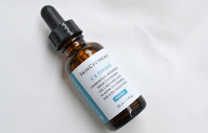 SkinCeuticals CE Ferulic bottle with dropper on a light background