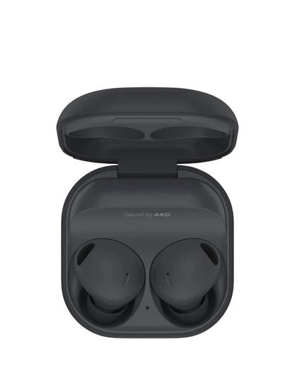 Black wireless earbuds in a charging case on a white background