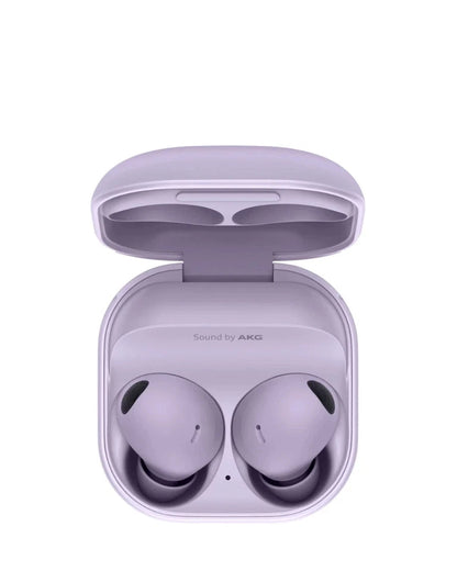 Purple wireless earbuds in an open case on a white background